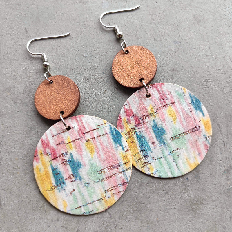 Cork & wood stripe disc earrings with colorful abstract pattern, boho style.