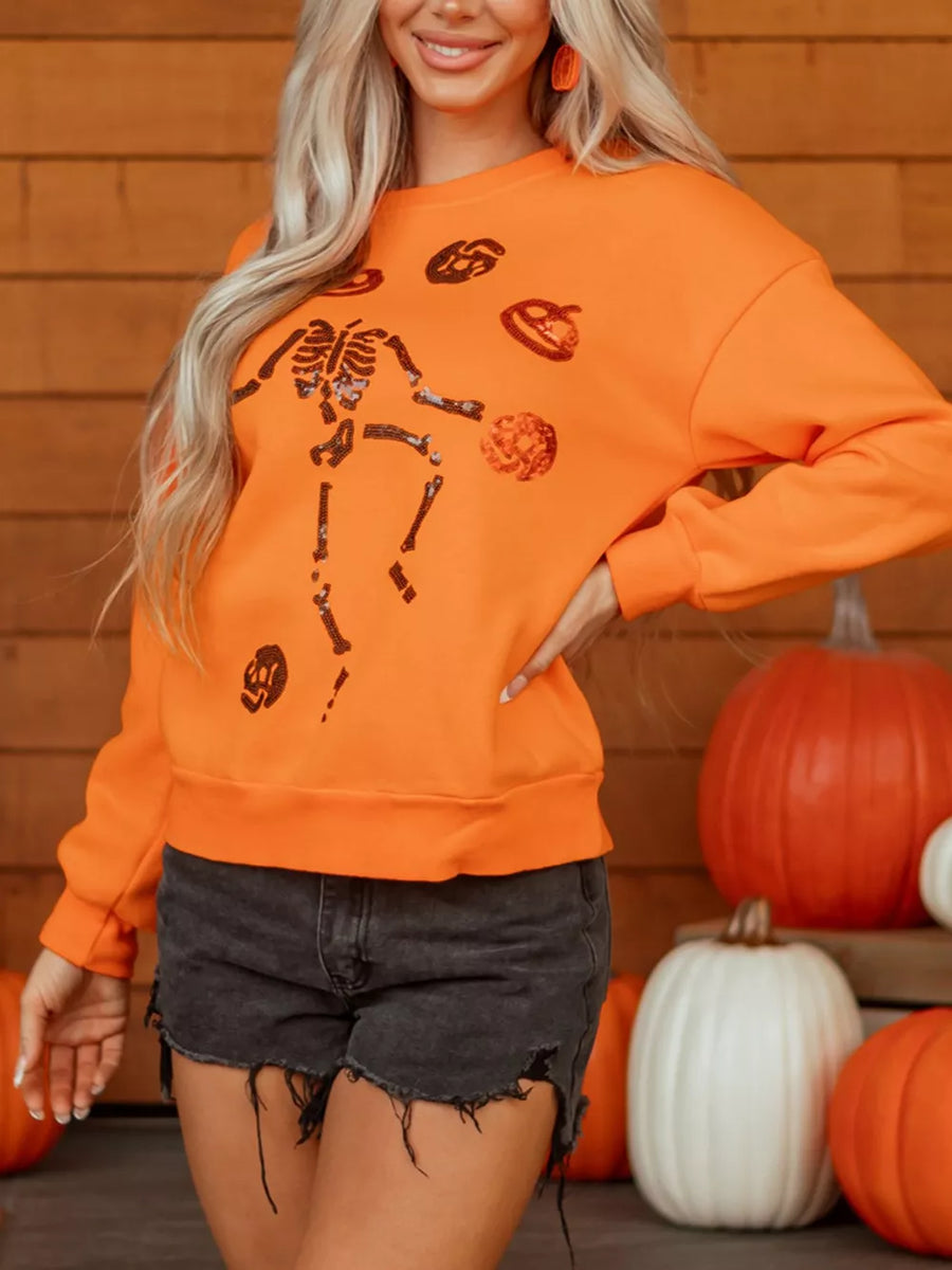 Orange crewneck sweater with hip-length and pullover