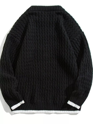 Black textured knit sweater for men with white striped cuffs and hem.