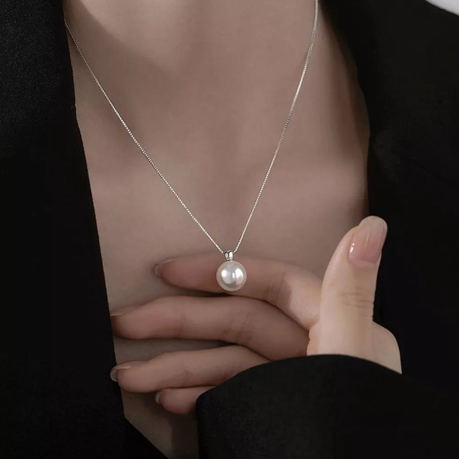 Synthetic Pearl,925 sterling silver Care instructions: Avoid wearing during exer necklace in silver with straight silhouette