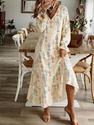 Cream v-neck dress with long sleeves and cactus print