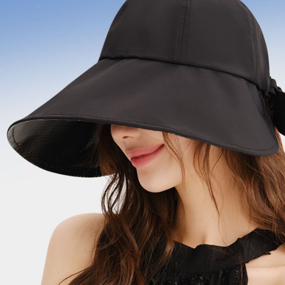Black wide brim sun hat with bowknot detail