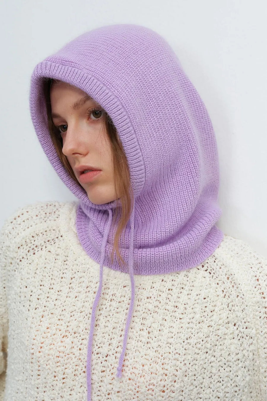 Hooded knit balaclava in Heliotrope Purple with drawstring detail.