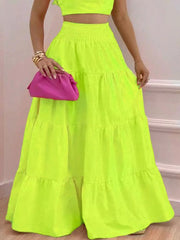 Lime ruffled crop top and tiered maxi skirt set with smocked waist detail.