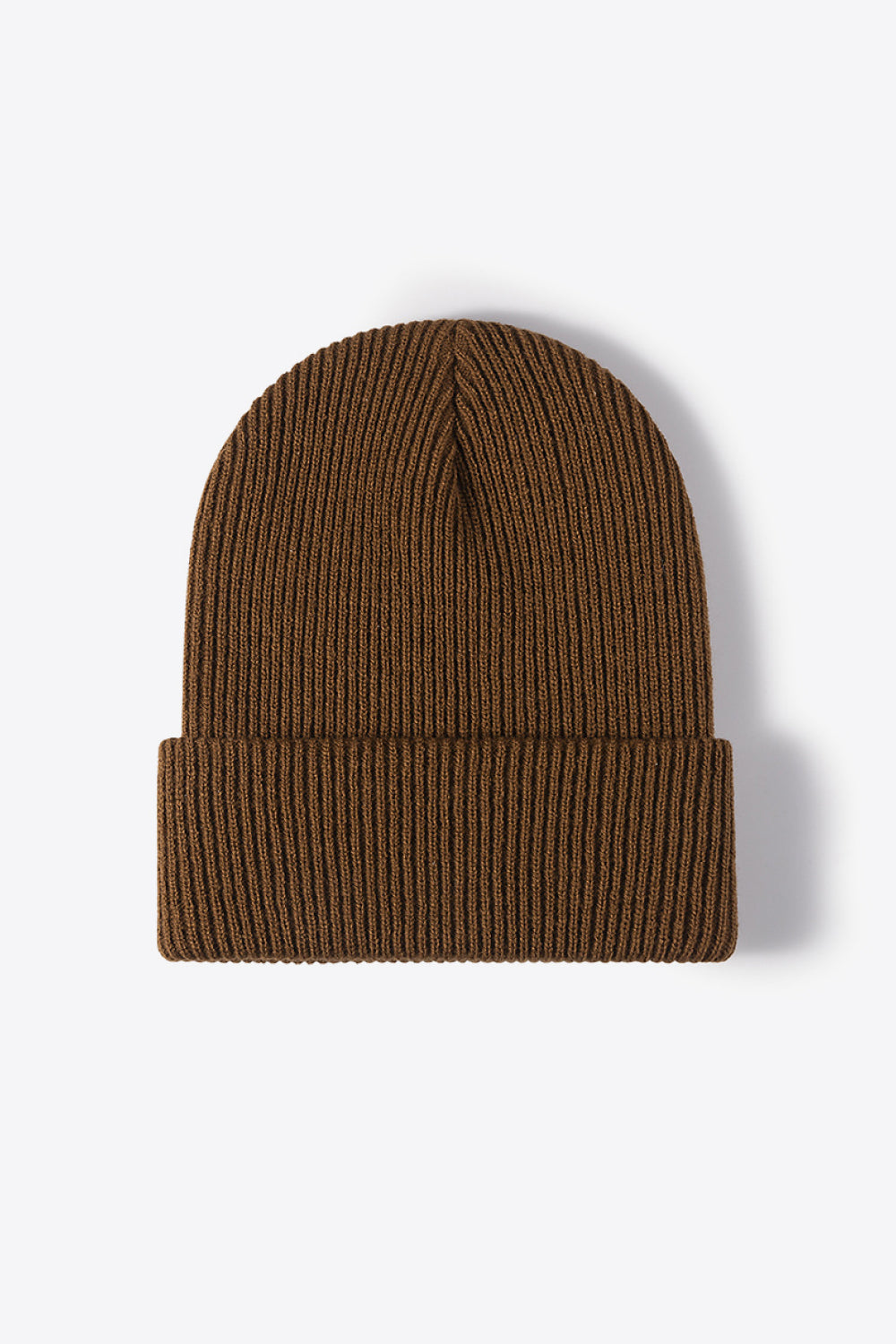 Brown ribbed knit beanie made of acrylic with a cuffed hem.