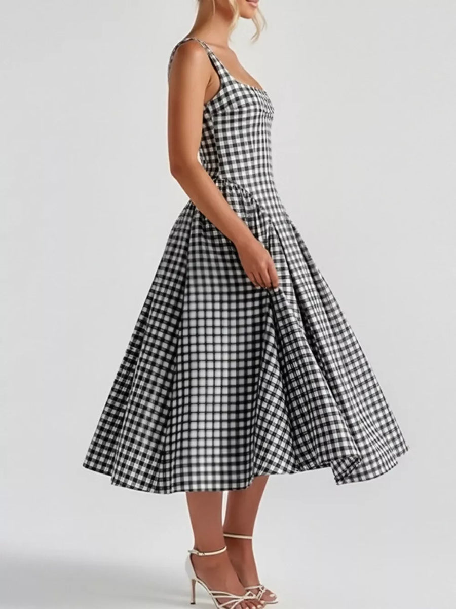 Plaid square neck midi dress in black with a-line skirt and flared hem.