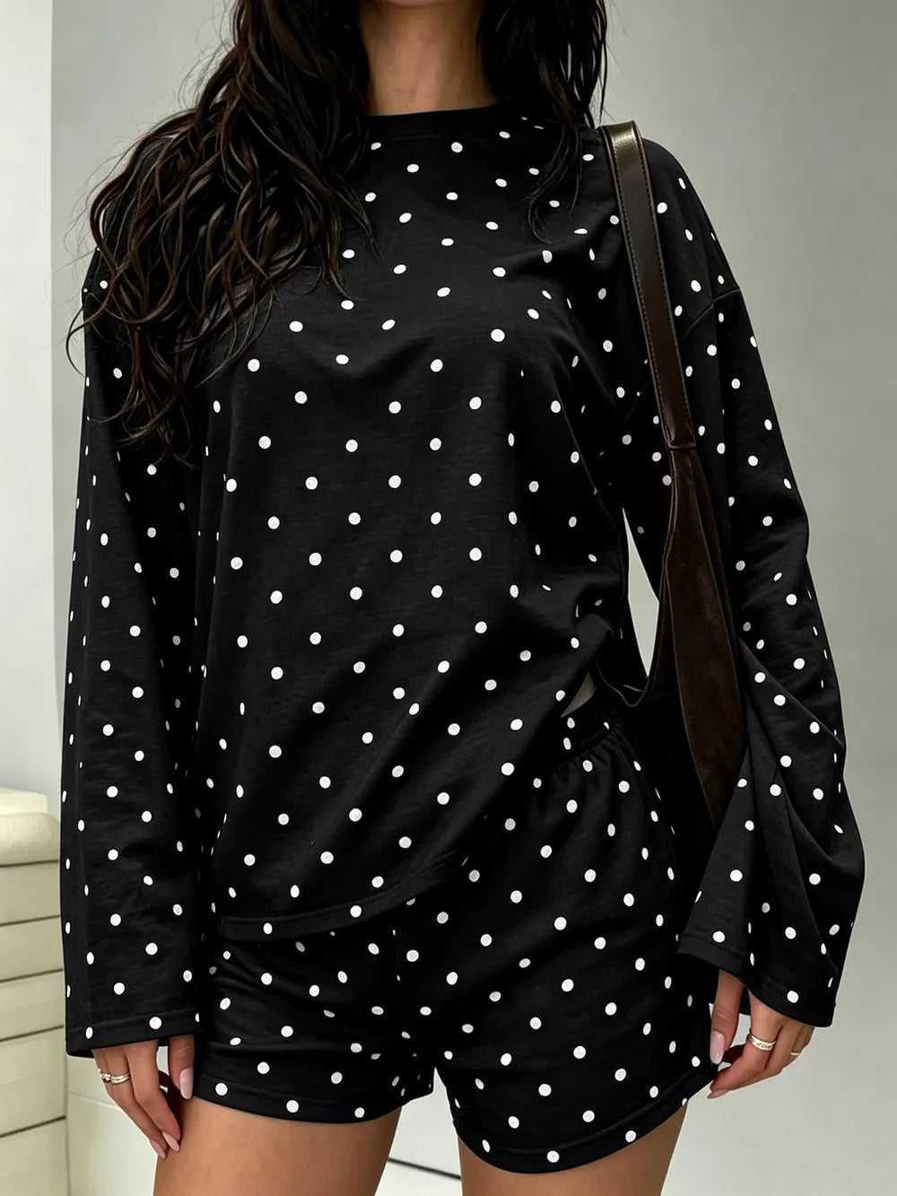 pajama set in black with polka dot and stretch