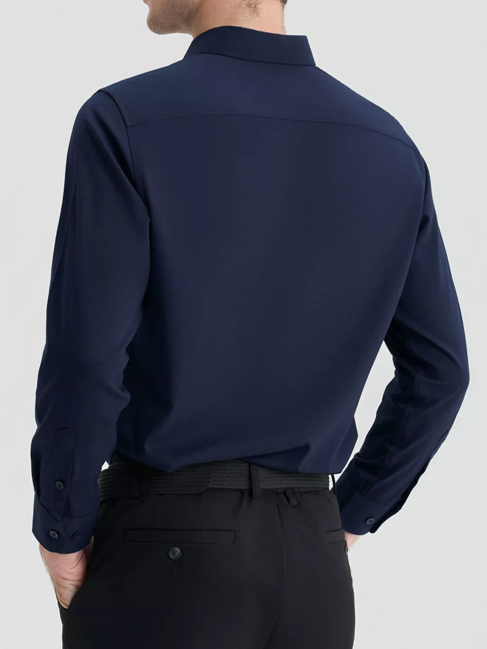 Navy long sleeve men's button-down shirt, slim fit, shown from the back.