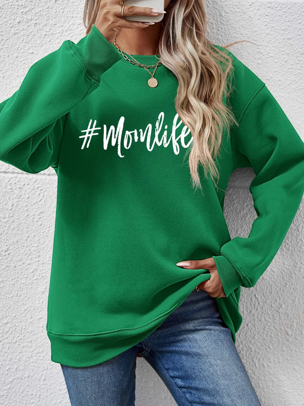 Green crewneck sweatshirt with #Momlife graphic, crew neck, long sleeves, casual fit