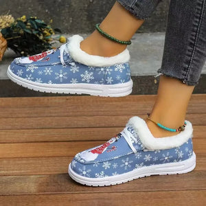 Light blue faux-fur lined loafers with snowman and snowflake print