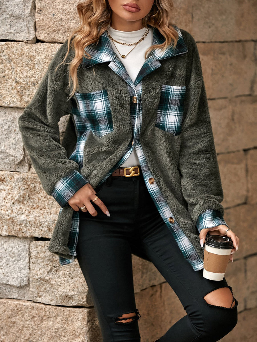 Teddy shacket with plaid collar and cuffs, featuring button front and chest pockets.