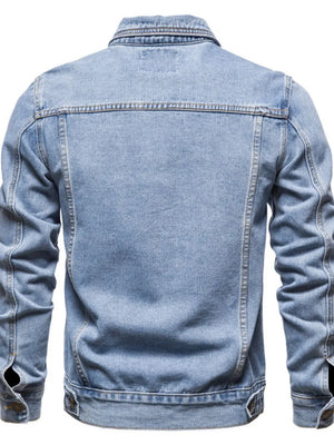 Light wash denim trucker jacket with classic fit and buttoned cuffs.