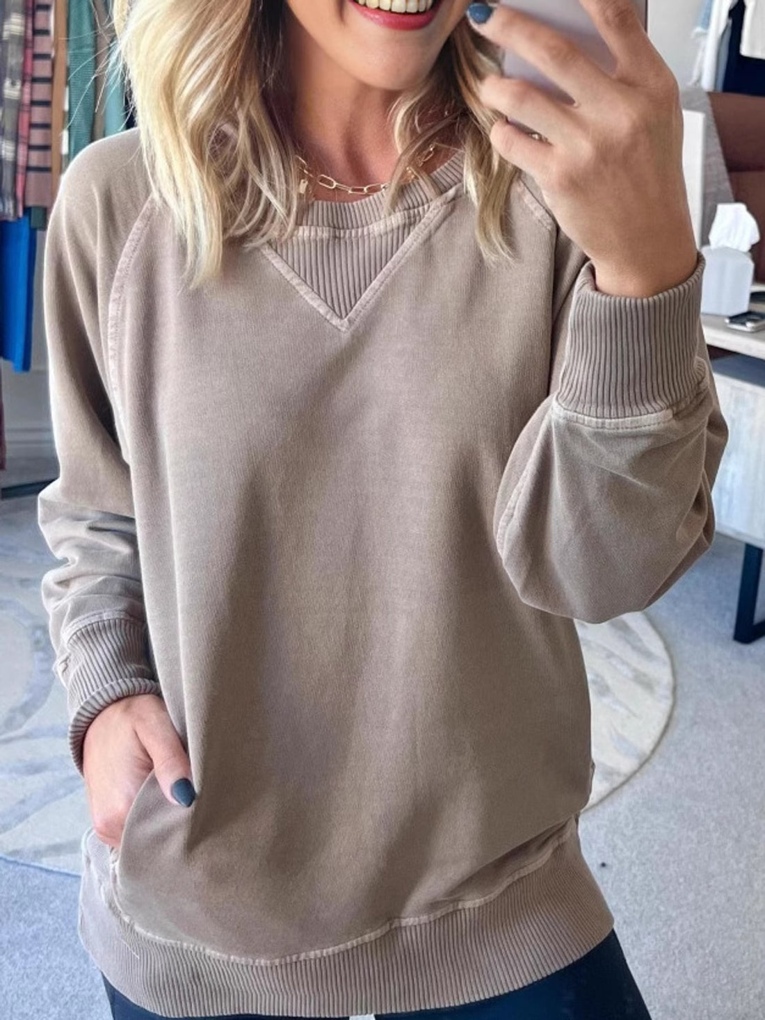 sweatshirt in taupe featuring ribbed and relaxed fit