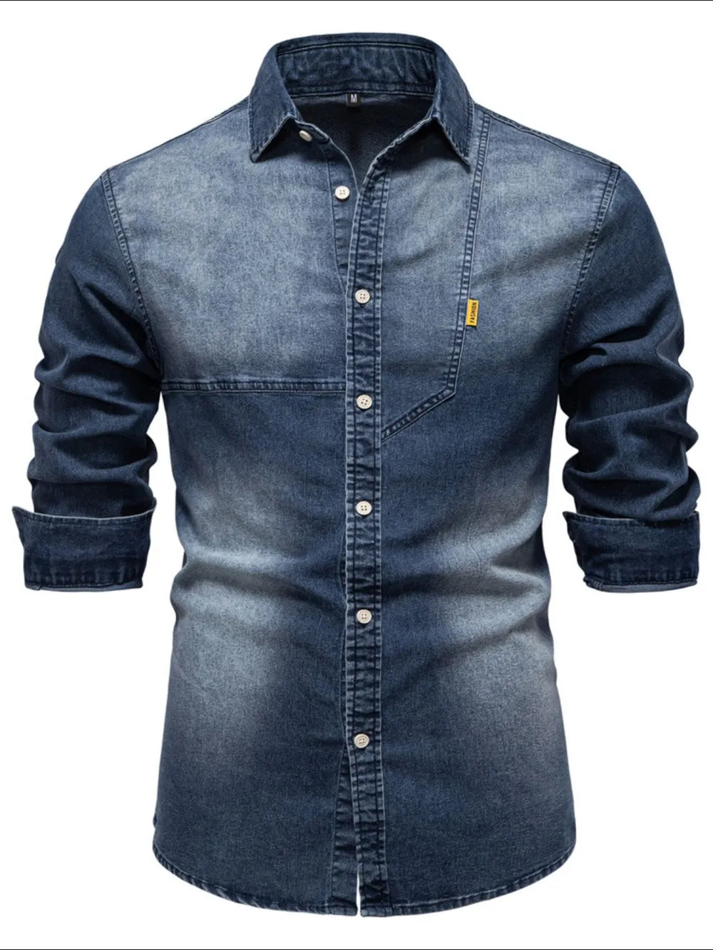 Dark wash denim button-down shirt with asymmetric pocket detail and rolled sleeves.