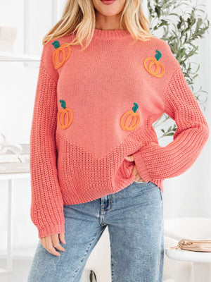 Burnt Coral knit sweater with embroidered pumpkins and a chevron detail.