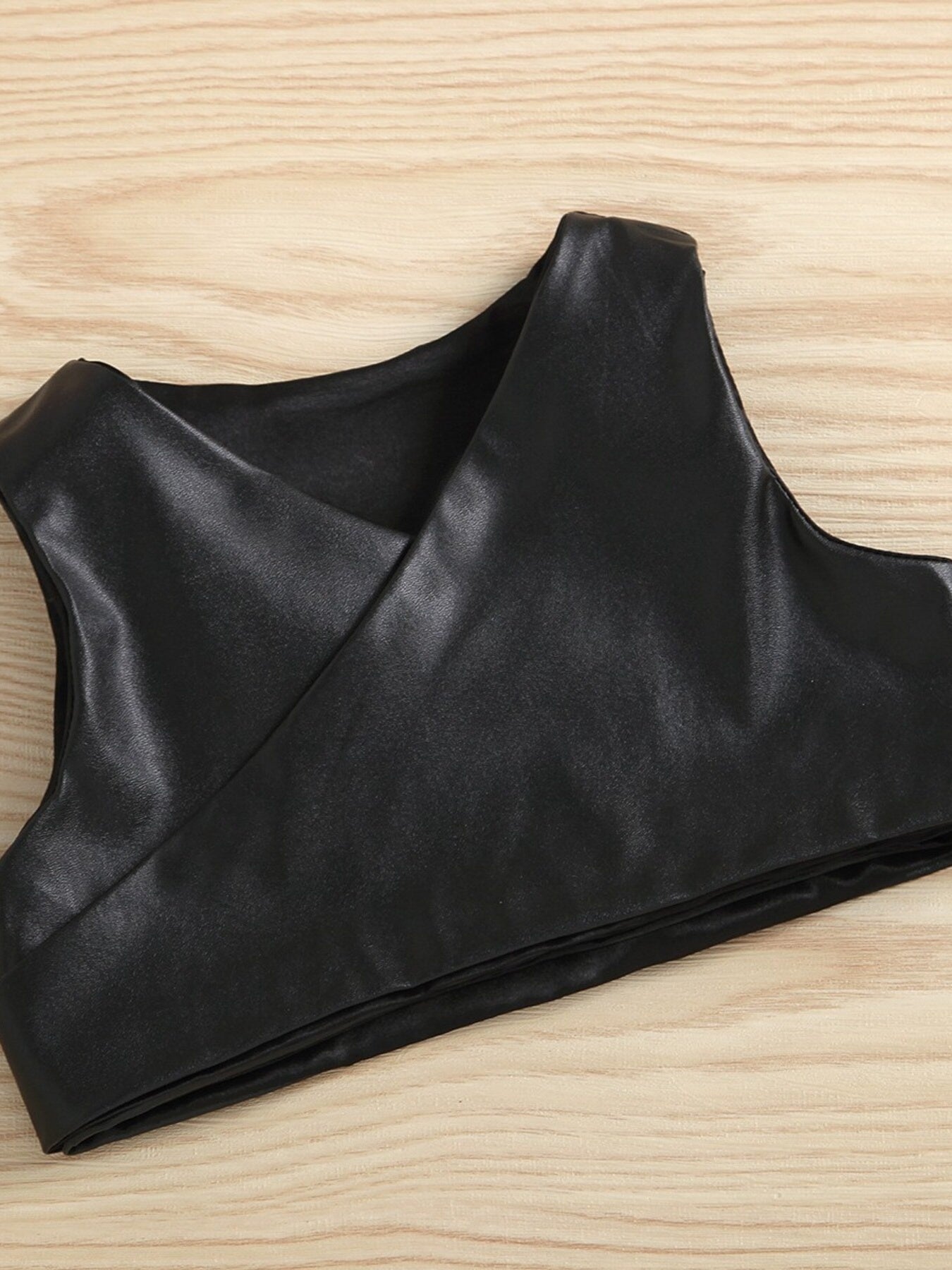Toddler black faux leather cropped vest with crossover neckline