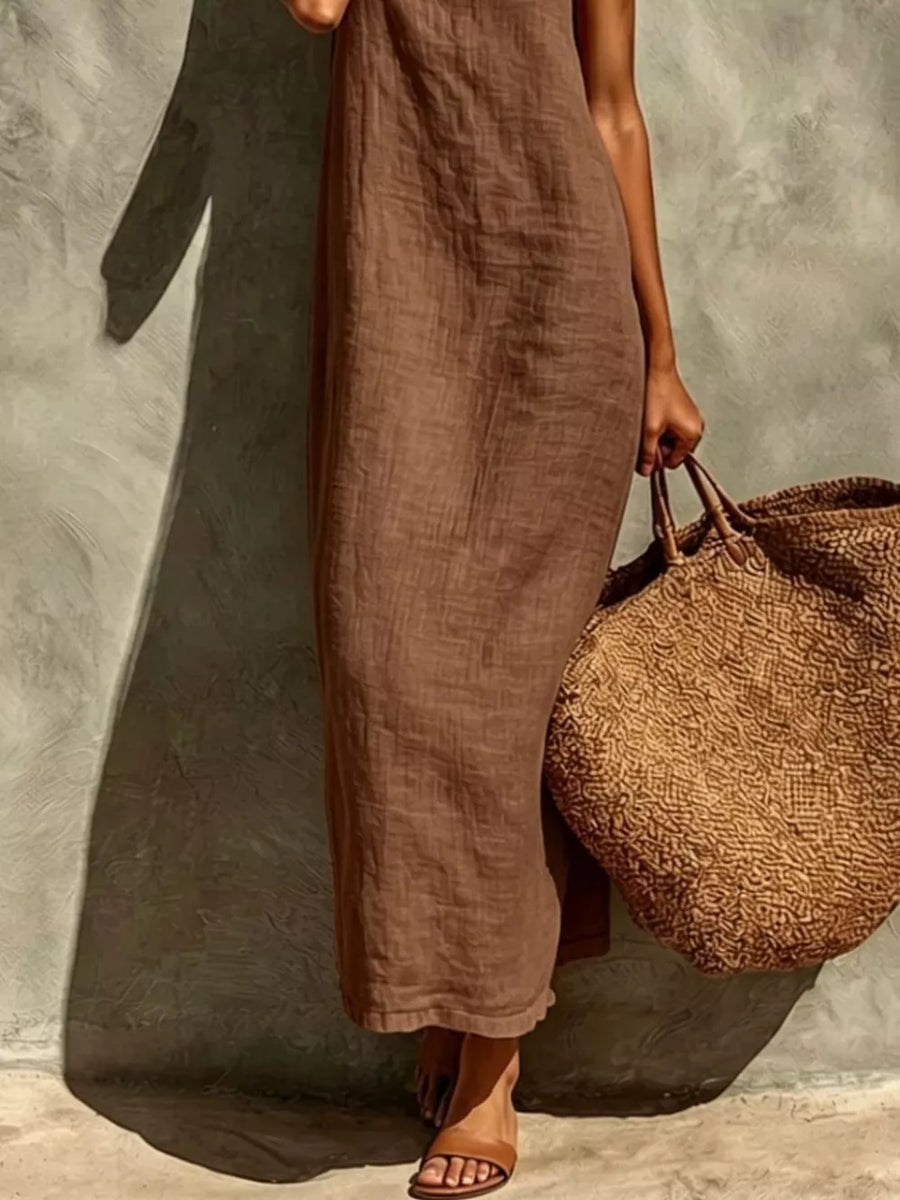 Taupe linen-blend maxi dress with a relaxed fit, sleeveless design, and subtle texture.