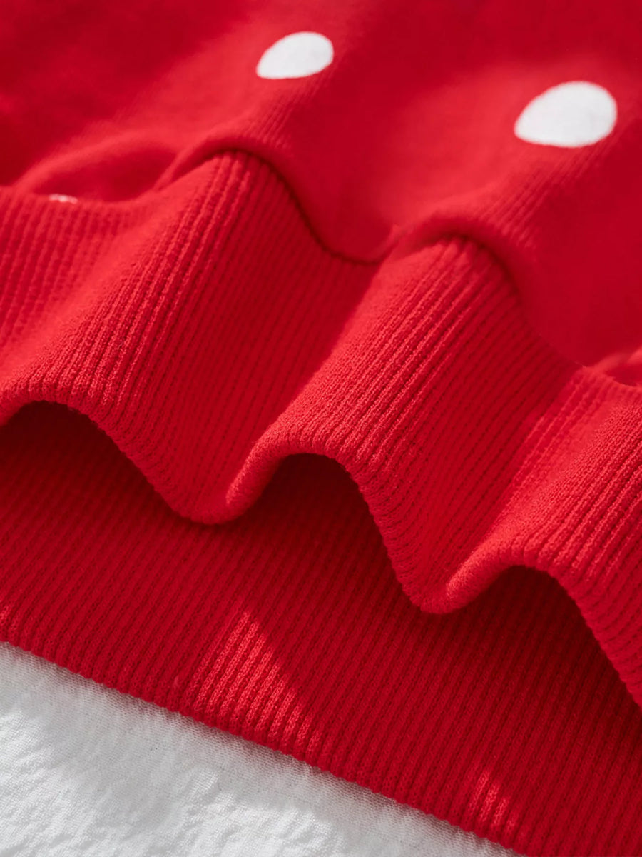 Red cotton sweatshirt with white polka dots and ribbed details