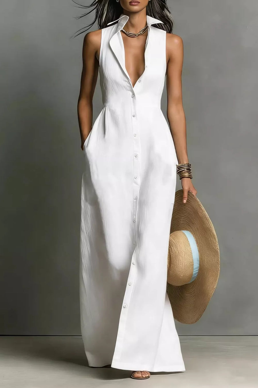White sleeveless maxi dress with button front and pockets, collared neckline