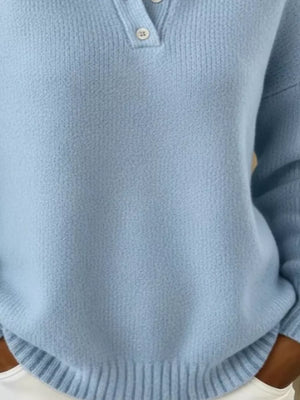 100% polyester Care instructions: Machine wash cold pullover sweater in Milky White with relaxed silhouette