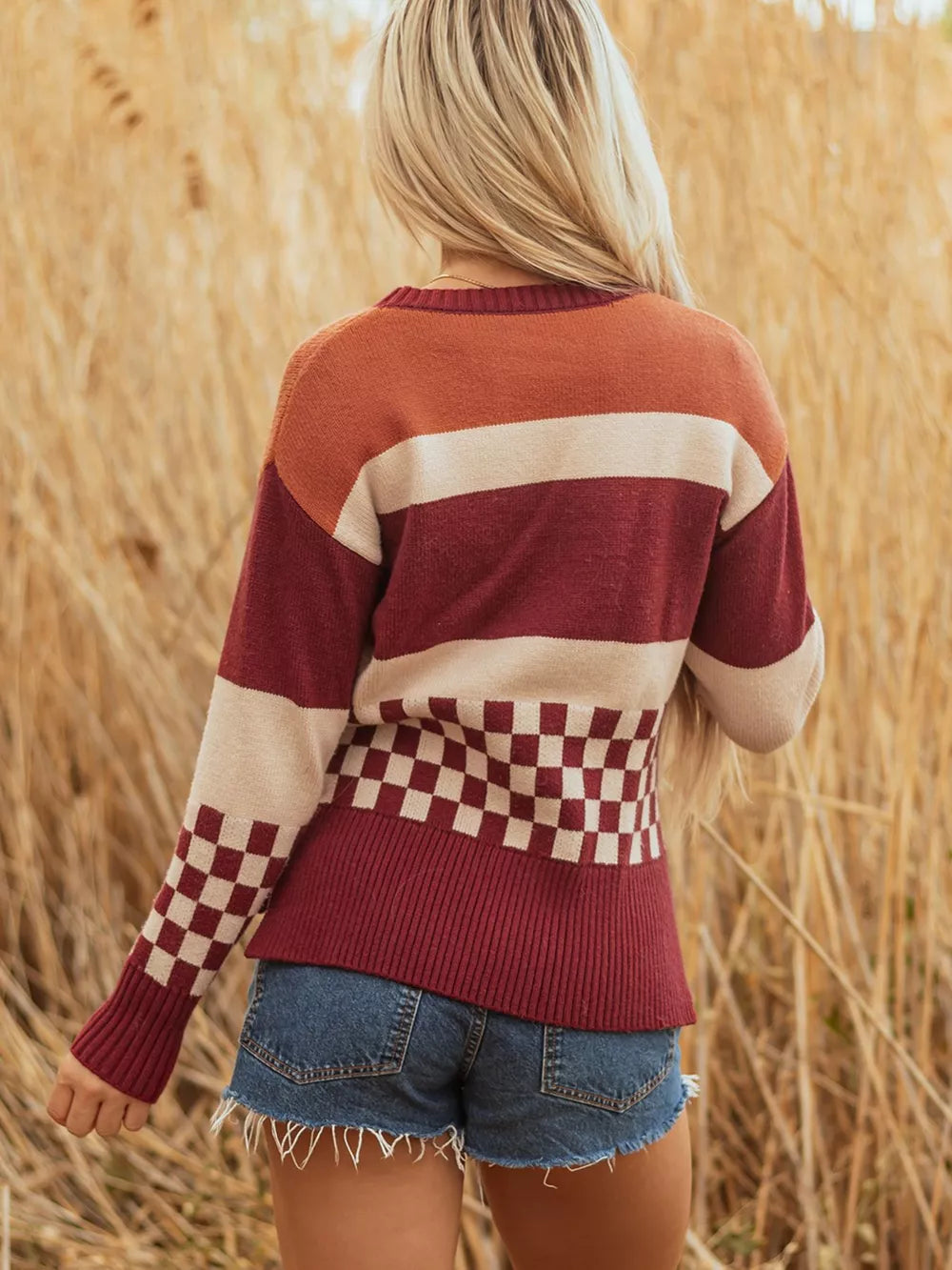 cream pullover sweater featuring ribbed and striped, checked