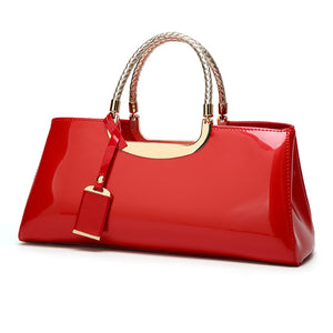 Patent Leather Medium Top Handle Handbag in red with top handle