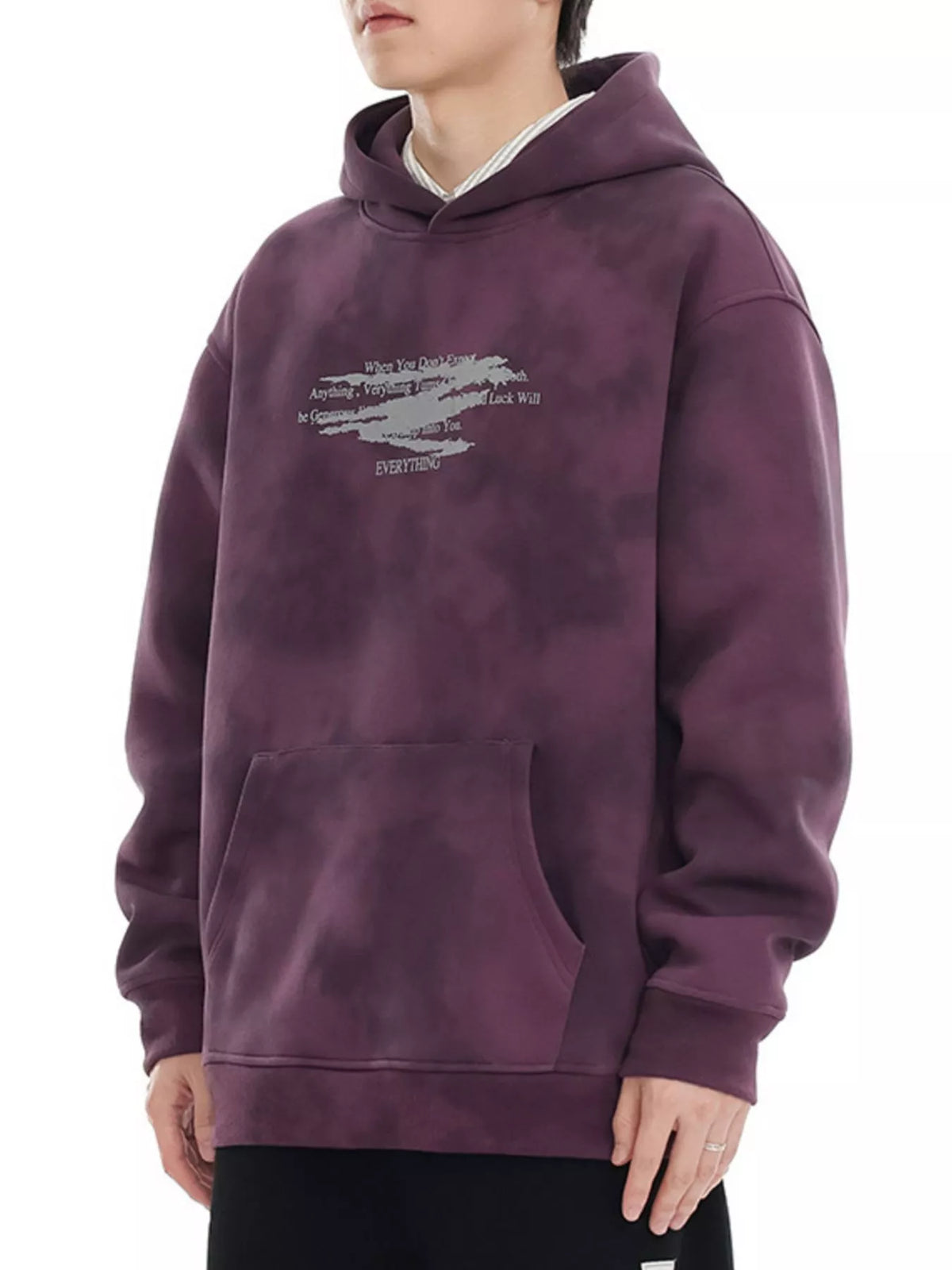Oversized tie-dye hoodie in Berry Purple with graphic print and front pocket.