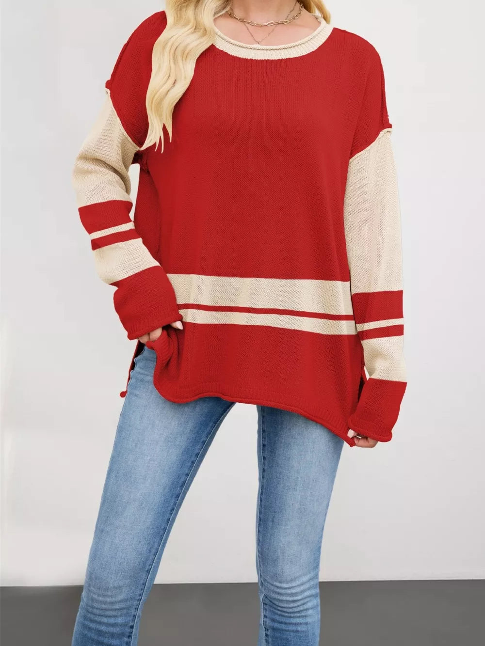 cream pullover sweater featuring ribbed and striped