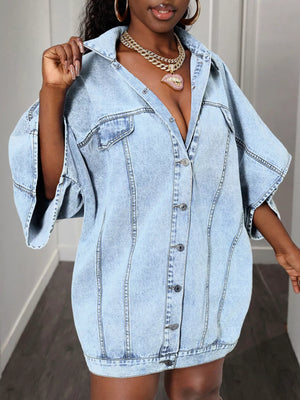 Sky blue oversized denim batwing dress with button front and wide sleeves.