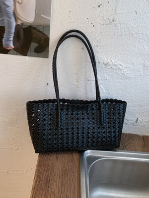 shoulder bag in black with woven and woven design