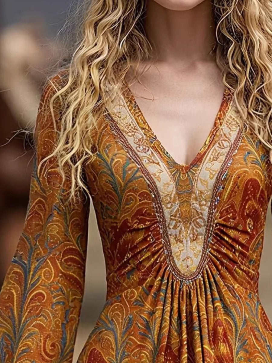 gold fit-and-flare dress featuring ruched and paisley
