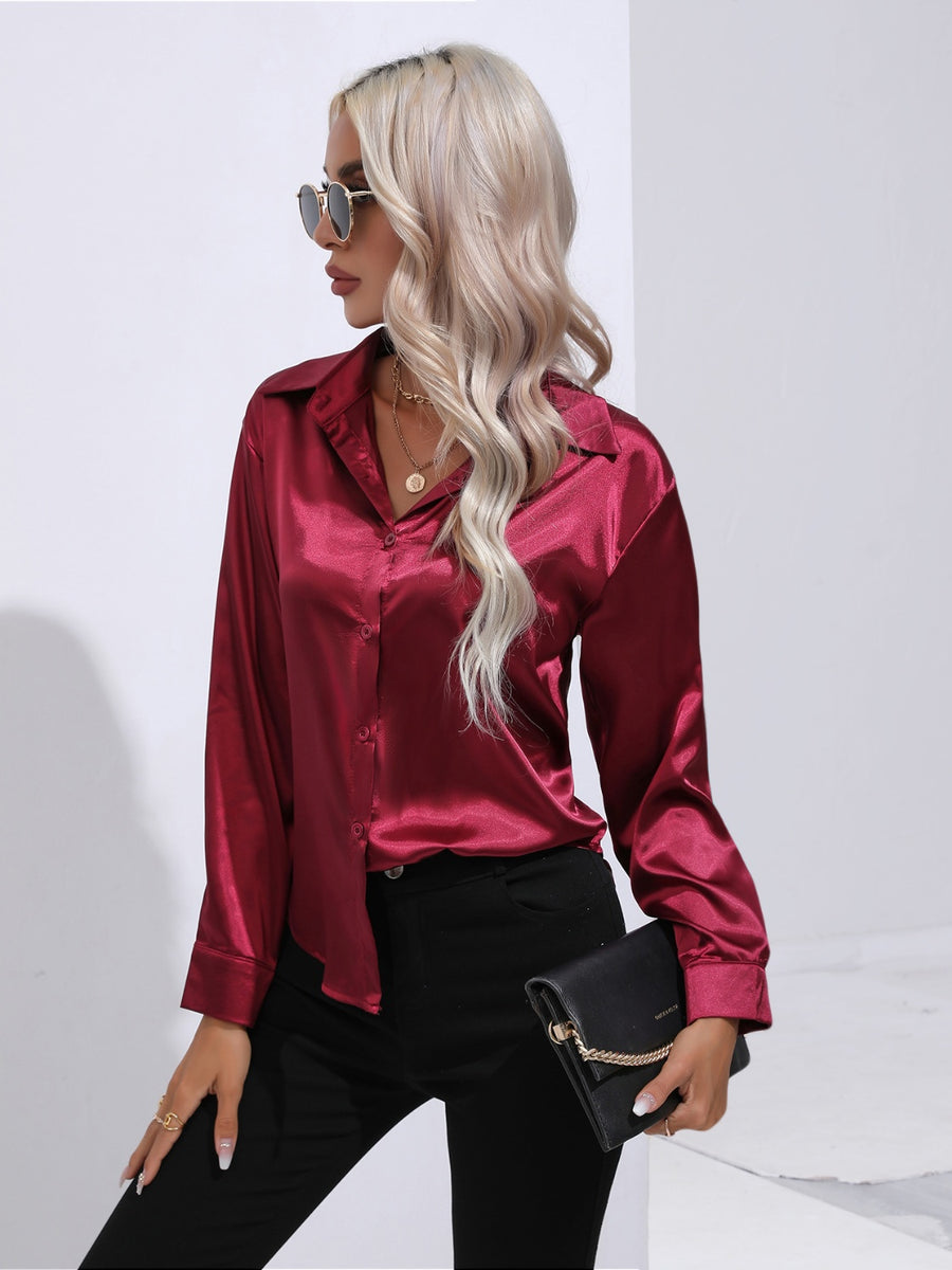 Burgundy satin tie-front blouse with buttoned front and collar.