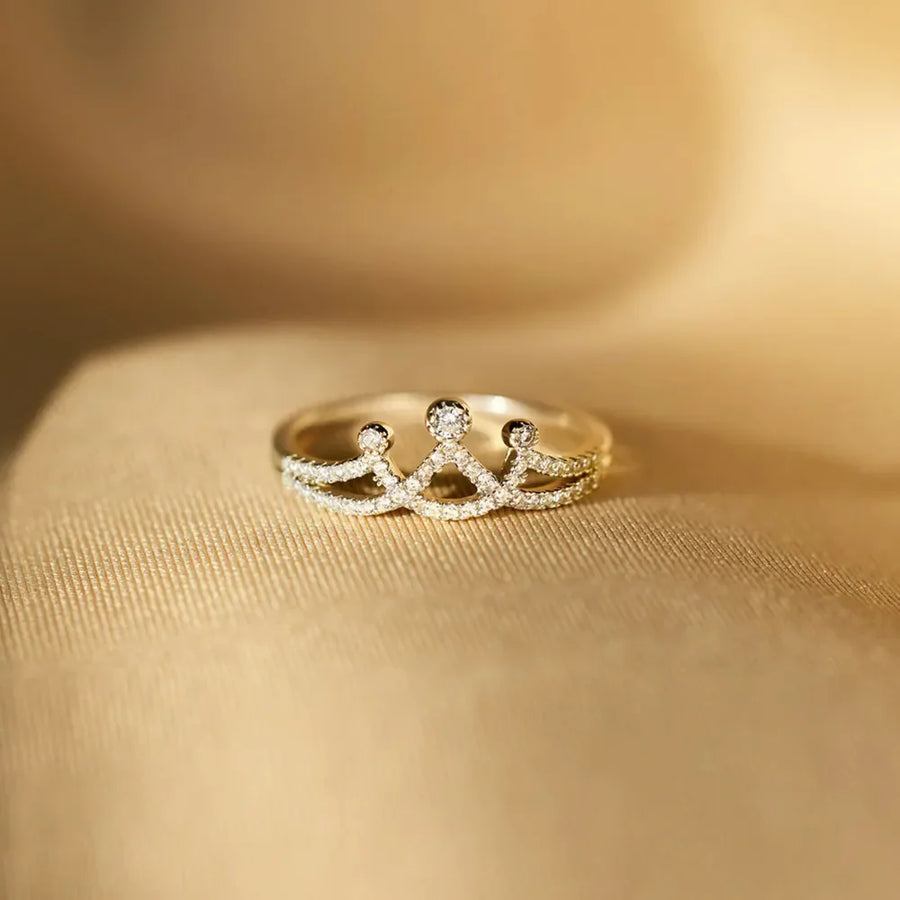 Gold crown motif ring with pave details