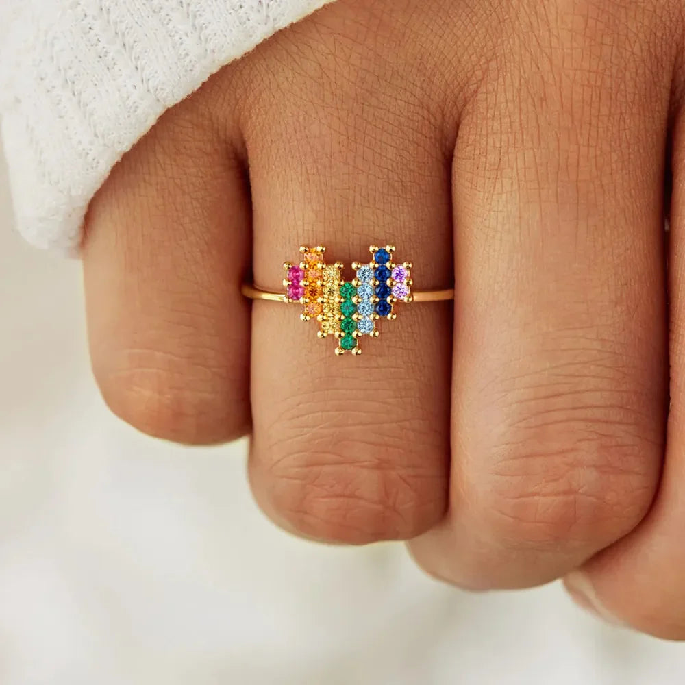 Gold pixel heart ring with rainbow colored stones