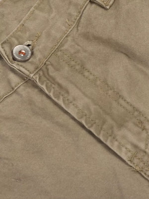 Khaki cargo pants with distressed details and button closure.