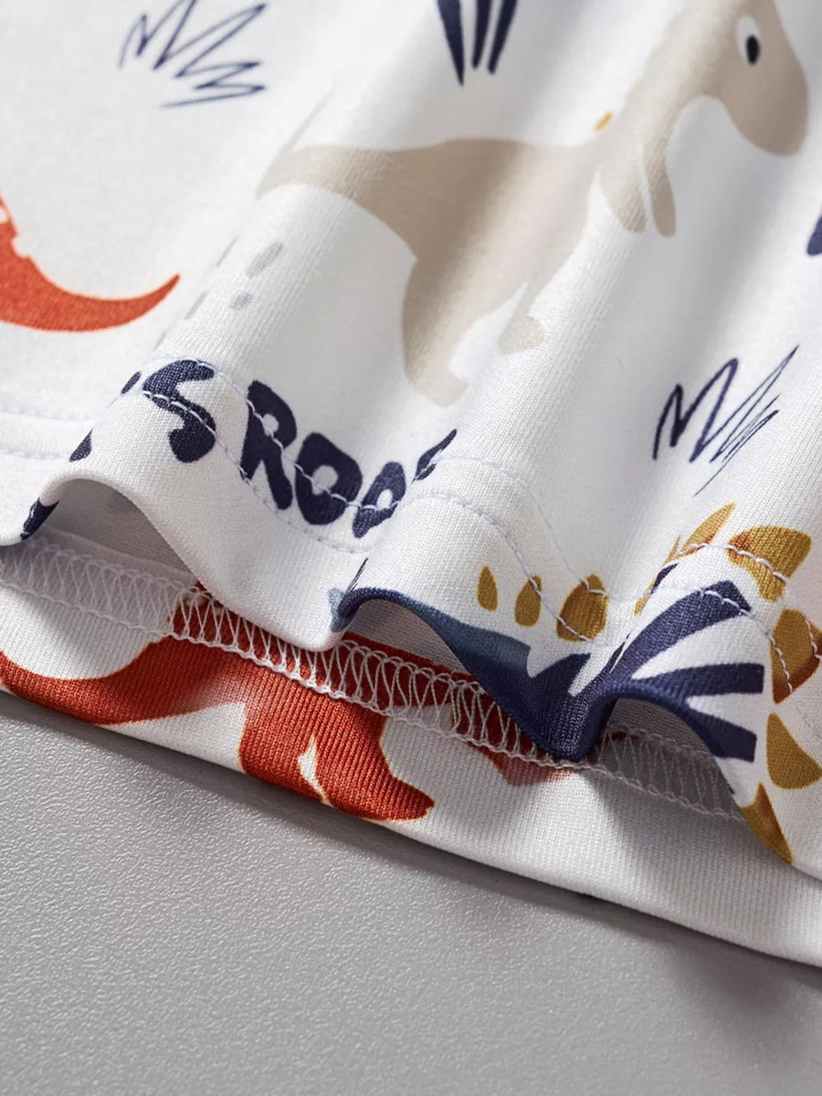 White t-shirt with a dinosaur print and "ROAR" text.