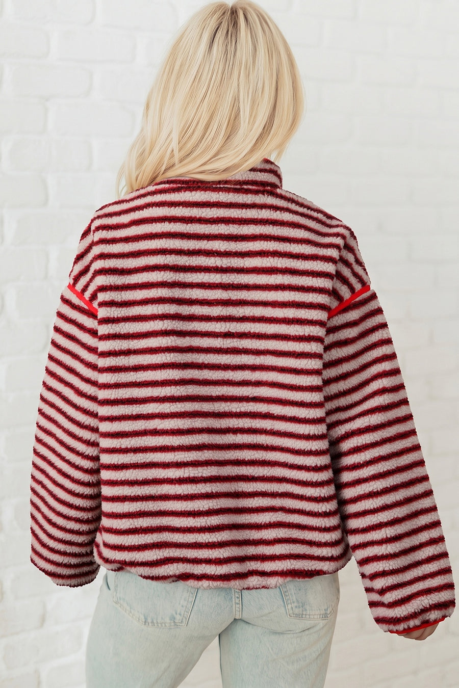 Shell:100% polyester+Lining: 100% polyester Care instructions: Machine wash cold sweatshirt in Strawberry with relaxed