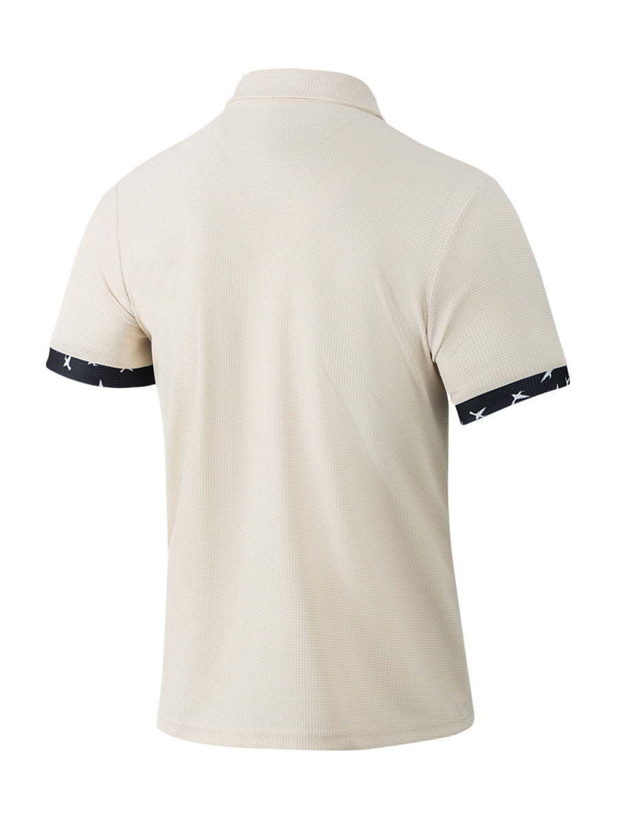Beige waffle textured short sleeve polo shirt with star print cuffs