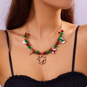 necklace in gold featuring charm details and draped fit
