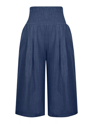 Navy blue wide-leg culottes with smocked high waist and pleated front