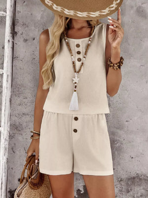Apricot cotton two-piece set with decorative buttons on top and shorts.