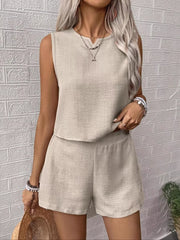 Beige V-notch sleeveless top and casual shorts set for women.