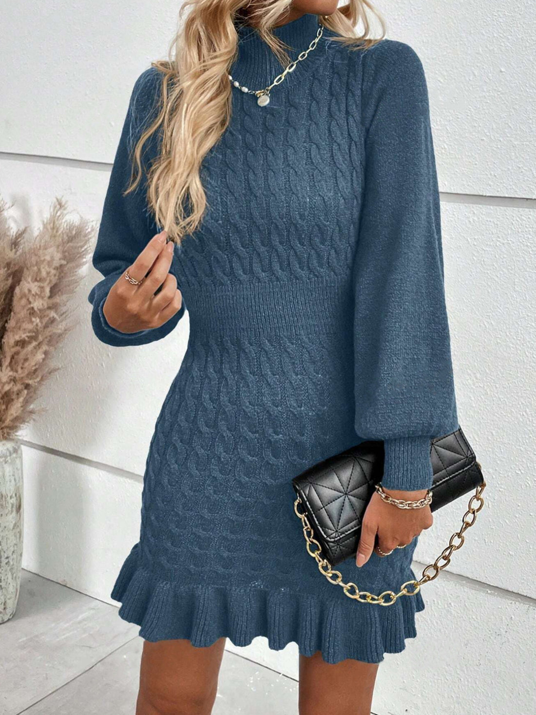 100% polyester Care instructions: Machine wash cold sweater dress in Black with fitted silhouette