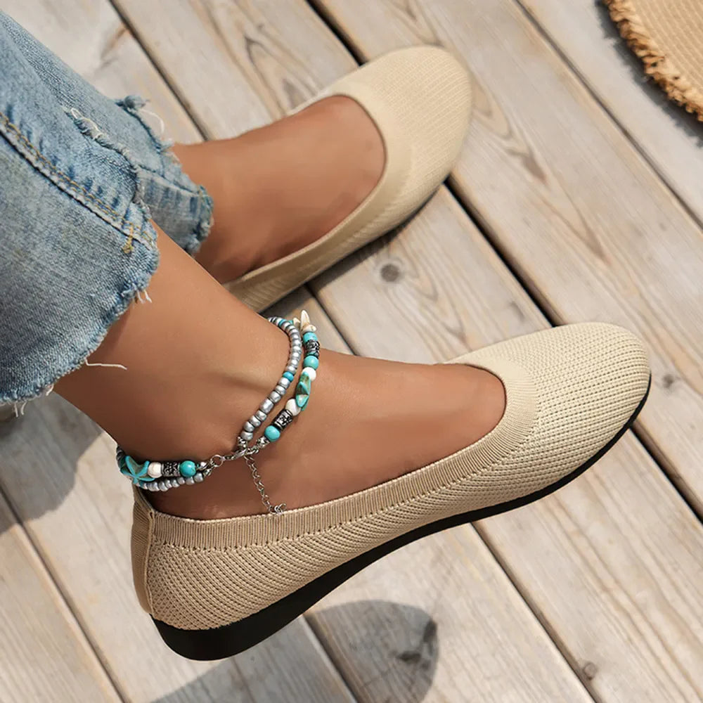 Textured knit slip-on flats in ivory with a beaded anklet.