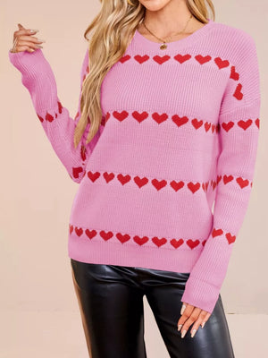 100% polyester Care instructions: Machine wash cold pullover sweater in Rose Red with relaxed silhouette