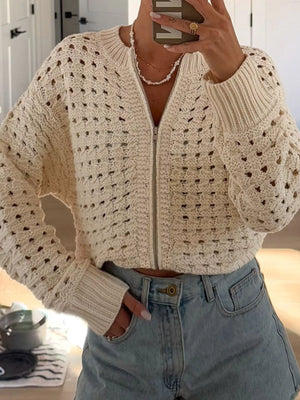 Beige openwork zip-up cardigan with ribbed cuffs and collar, made of acrylic.