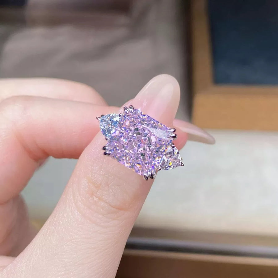 lavender ring featuring zircon stones and geometric