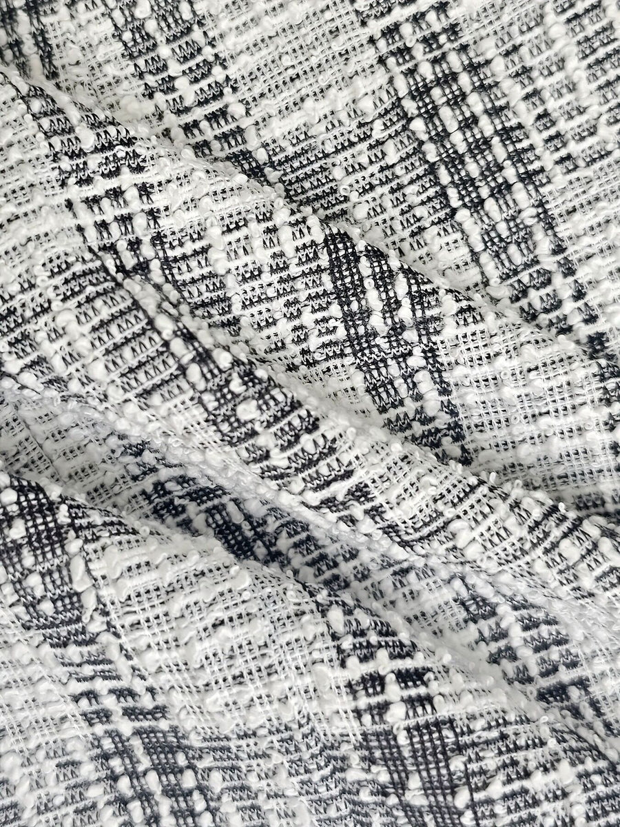 mini dress featuring plaid in white with 100% polyester Care instructions: Machine wash cold texture