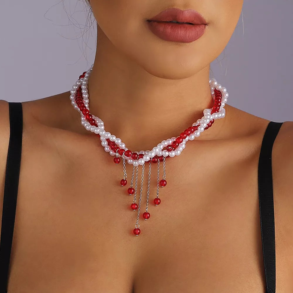 necklace in red featuring beaded and fitted fit