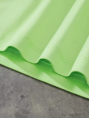Lime green t-shirt with a soft cotton feel and visible stitching details.